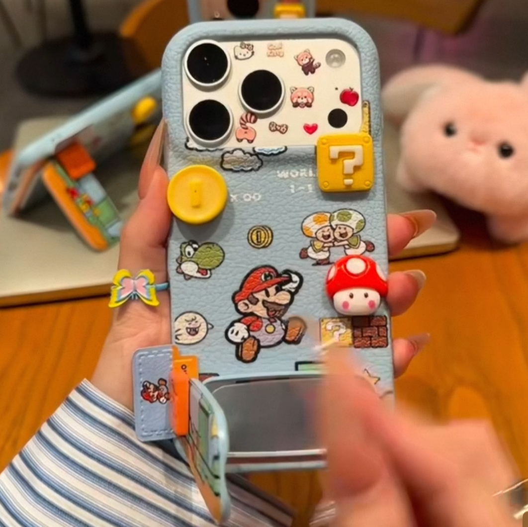 Phone case with mario cartoon character design held by a person